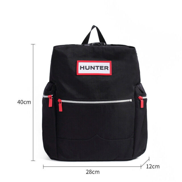 Hunter Original Packable Crossbody Bag | Women's | Black | Size One Size | Handbags | Crossbody | Shoulder Bag HANDBAG FEATURES: Rose gold-tone hardware. HANDBAG DETAILS: 8.75"H x 3"W x 6"D. Crossbody strap: 21.5'' to 23.5'' drop. Zipper closure. Interior: 2 main compartments, zip pocket. CONSTRUCTION & CARE: Faux leather. Polyester lining. Imported.